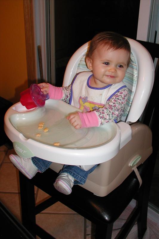 Molly trying out her high chair