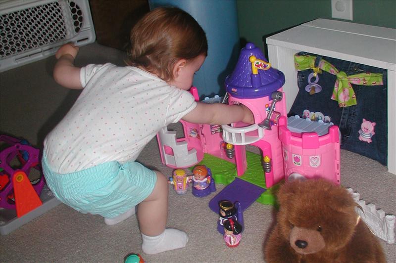 Molly playing with her castle